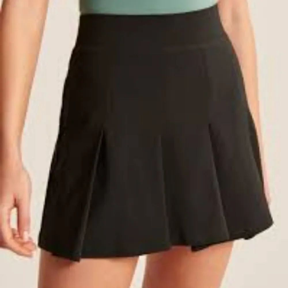 I.N.C INTERNATIONAL CONCEPTS WOMEN"S PLEATED SHORT SKIRT